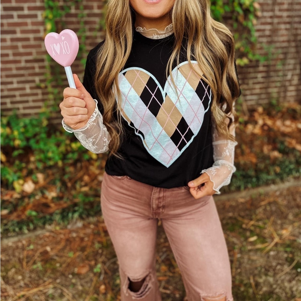 Add a touch of style to your wardrobe with our Plaid Heart Shirt.